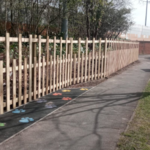 Paw prints leading to the Holy Brook Nook Forest School in Coley, with new safety fencing