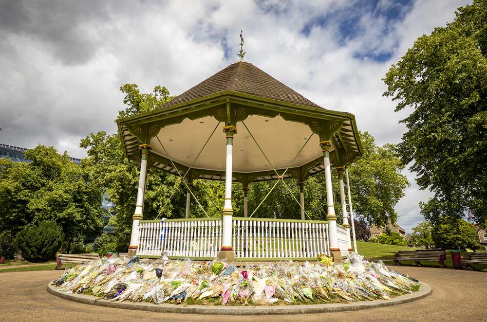 Bunches of flowers surrounding the band stand in The Forbury