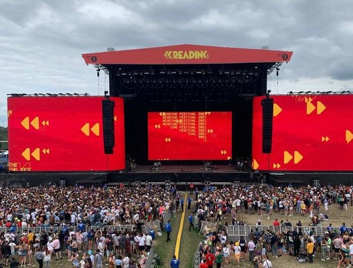 Big stage with crowd in front of it at Reading Festival