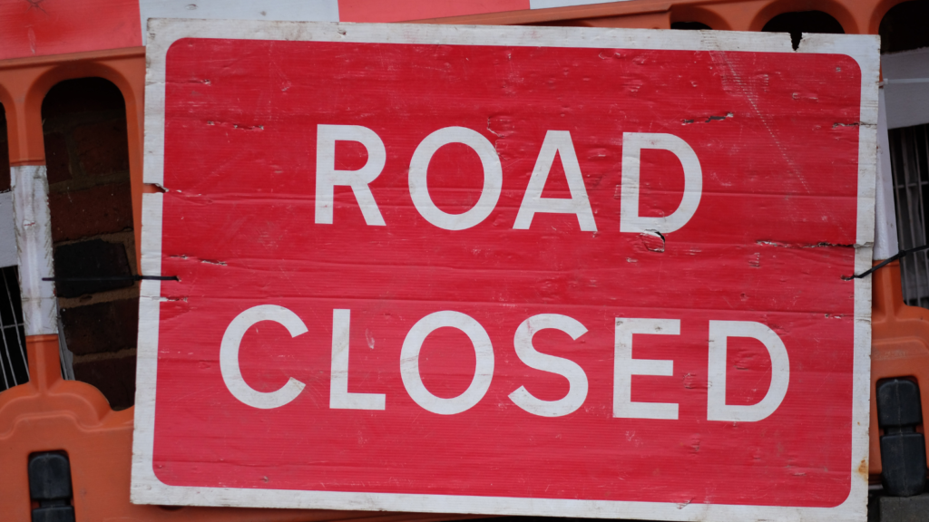 Road sign with text saying "Road Closed"