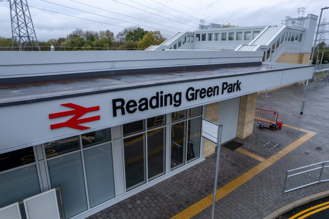 Design showing people outside the front of Reading Green Park station 