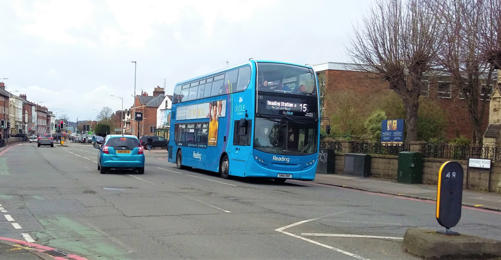 Number 15 blue bus going along Oxford Road.