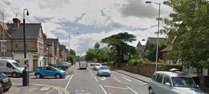 Oxford Road looking east with cars waiting to turn into and out of Beresford Road.