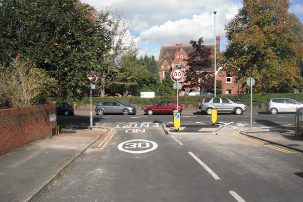 Cycle and pedestrian entry onto Talfourd Avenue with no entry markings on the road for cars.