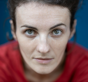 Close up photo of woman's face.