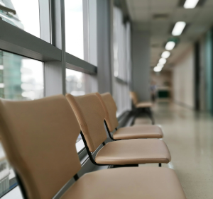 Row of empty seats in a hospital.