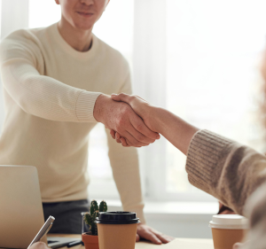 People shaking hands.