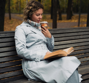 Woman sitting on a bench.