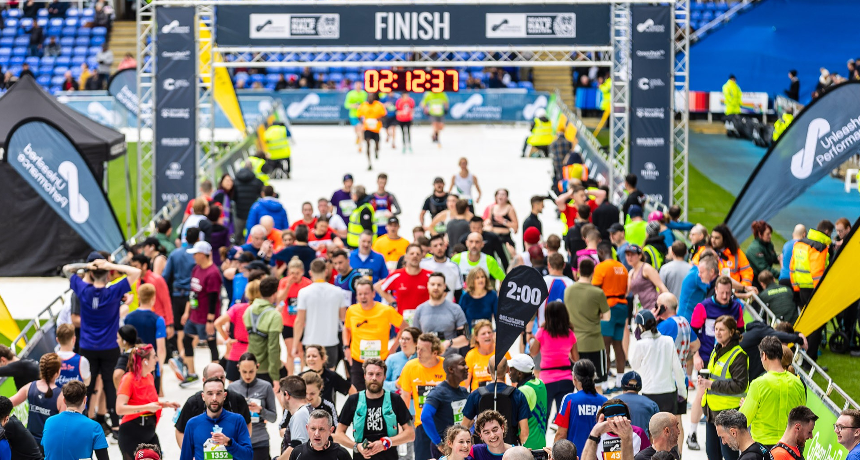 photo of Reading half marathon runners crossing the finish line