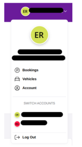 Account dropdown menu showing a profile with initials 'ER' in a yellow-green circle, followed by redacted user information. Menu options include Bookings (with parking icon), Vehicles (with car icon), and Account (with person icon). Below is a 'SWITCH ACCOUNTS' section showing two account options with initials 'ER' and 'RG' in colored circles, each with redacted names. At the bottom is a 'Log Out' option with an exit arrow icon.