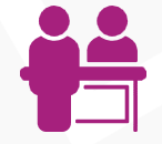 Minimalist representation of a reception desk with one person in front and another behind it.